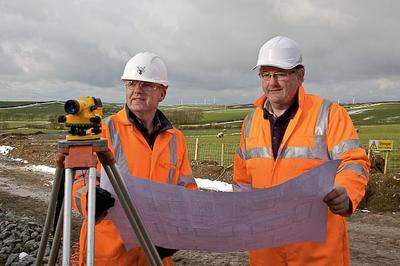 (LtoR) Phil Wooster, Ysgellog Site Manager, Raymond Brown Construction and Hywel Pritchard, Senior Partner, Pritchard Brothers, Rhosybol at Ysgellog Farm.